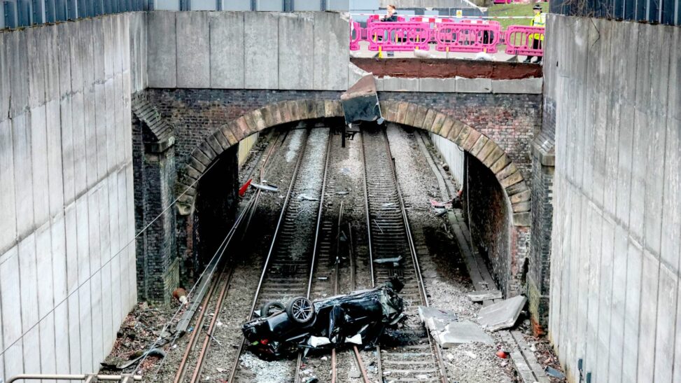 Major Travel Disruption After Car Crashes Onto Railway Lines Driver Arrested