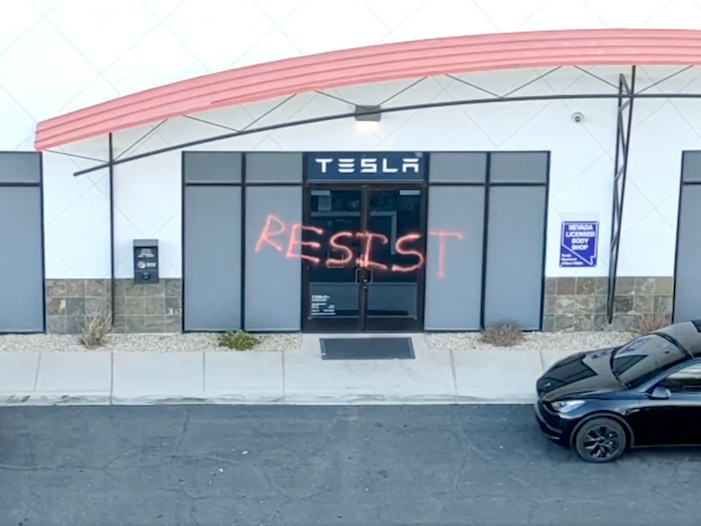 Doj says attacks on tesla stores are 'domestic terrorism' as more incidents emerge
