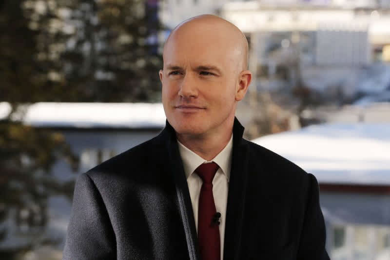 Coinbase shares spike as crypto exchange set to join s&p 500, replacing discover financial
