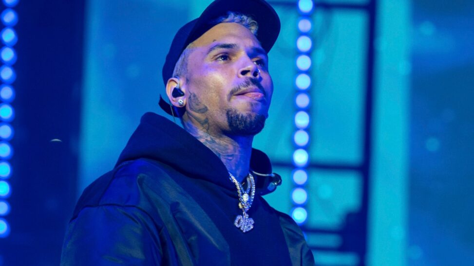 Chris brown arrested over alleged bottle attack