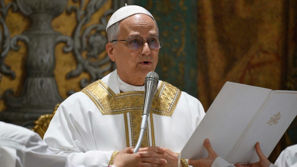 Pope leo holds first mass and says he hopes to help church be a beacon of light
