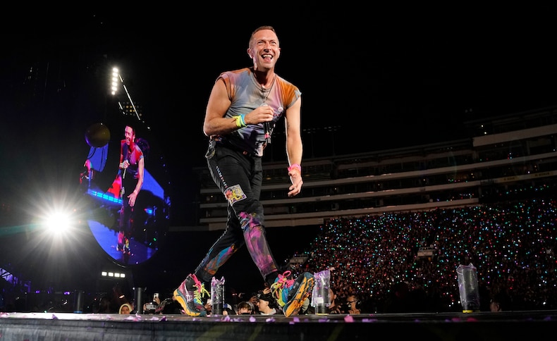 Astronomer ceo placed on leave after coldplay 'kiss cam' video appeared to show him embracing hr chief