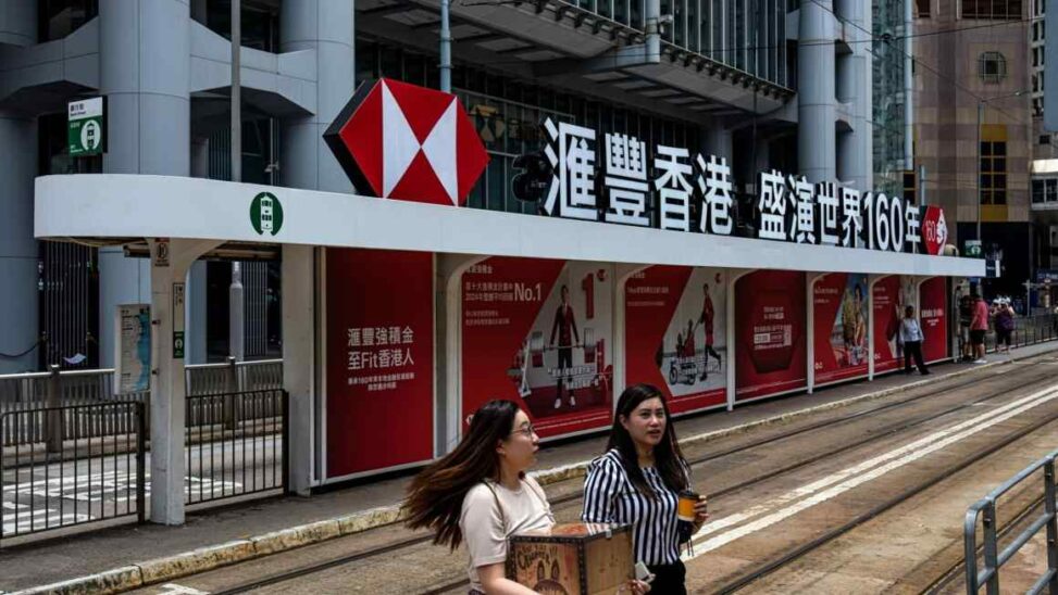 Hsbc profits hit by $2.1bn charge for chinese bank stake