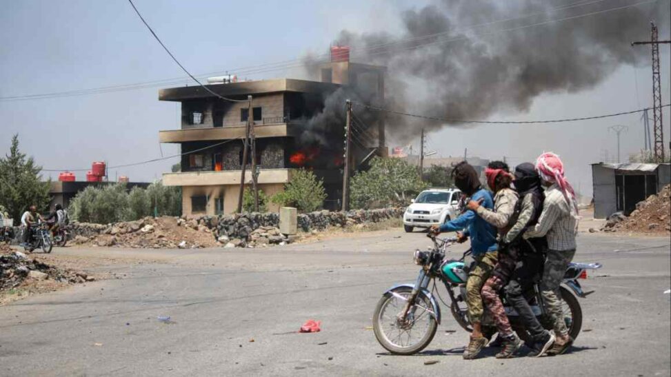 Bedouin fighters withdraw from syrian province hit by violence