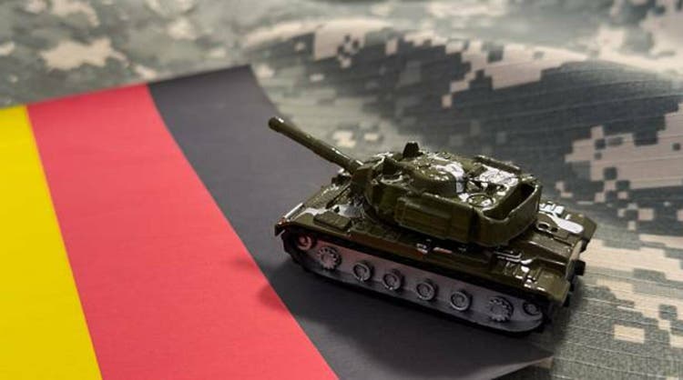 German defense minister calls arms makers to ramp up capacity report