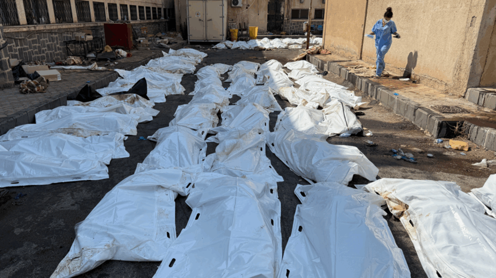 Rows of decomposing bodies that can't be buried because of fierce fighting in syrian city