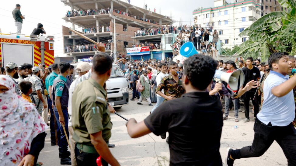 Air force jet crashes into college campus in bangladesh at least 19 people dead