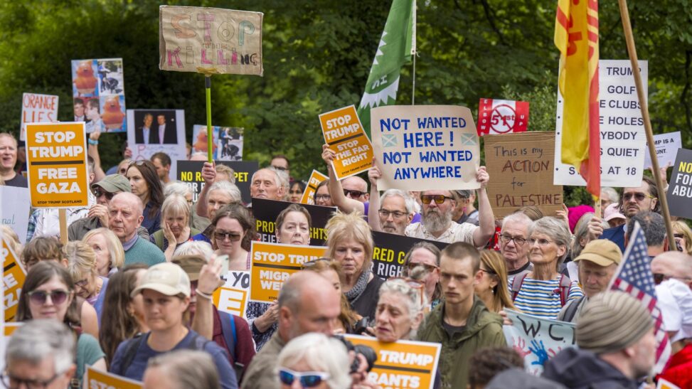 Trump able to enjoy round of golf at turnberry as protesters speak out from hundreds of miles away