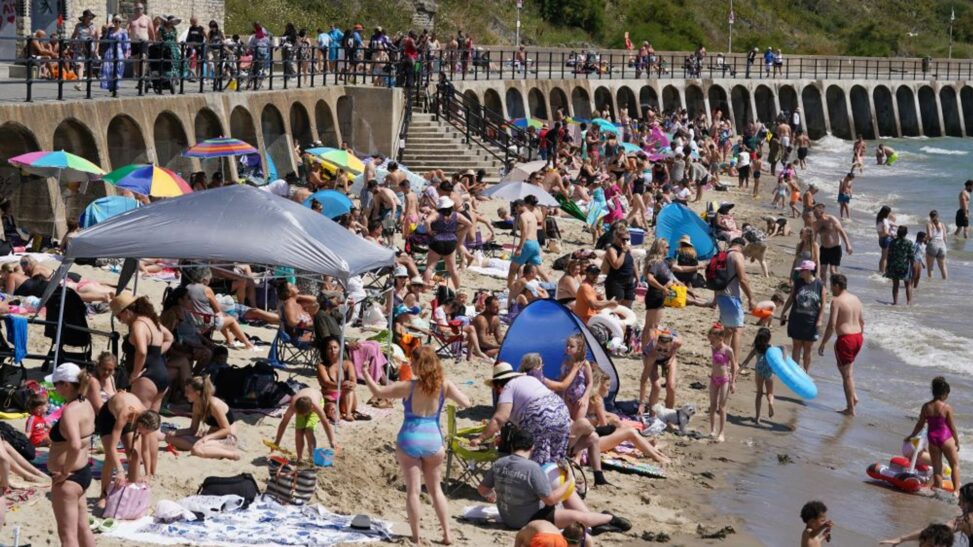 Scotland and wales record their hottest days of the year as uk wide heatwave peaks