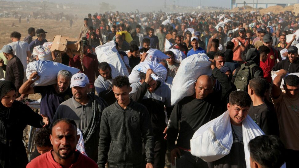 Two security workers injured after grenades thrown at gaza aid site, group says