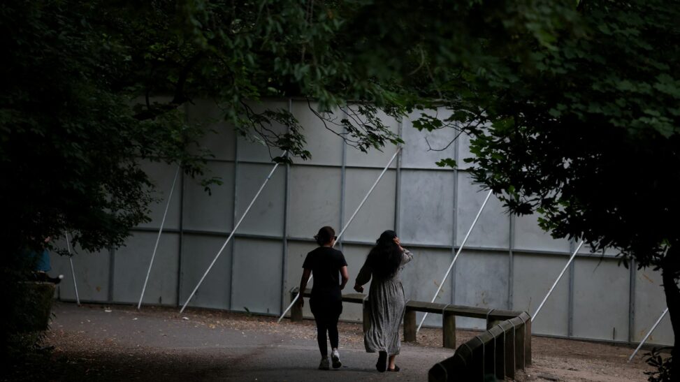 Huge steel fences erected to stop ticketless fans from watching oasis concert