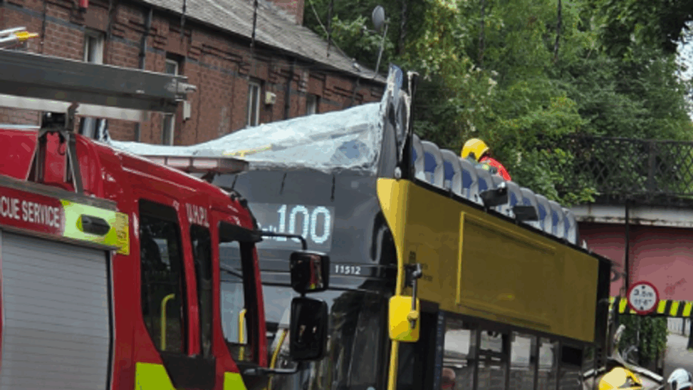 Bus driver arrested after 20 people injured in crash