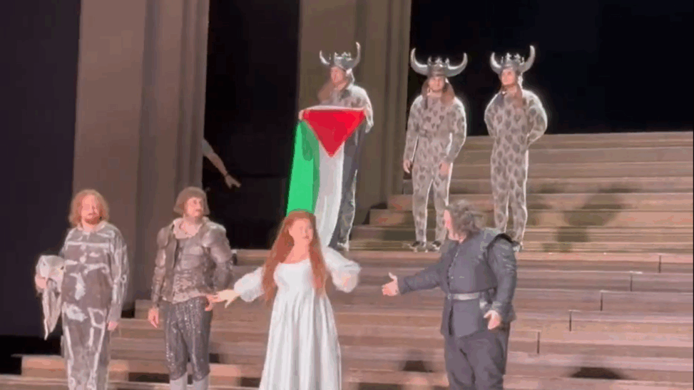 Scuffle breaks out on stage of royal opera house after performer unfurls palestinian flag