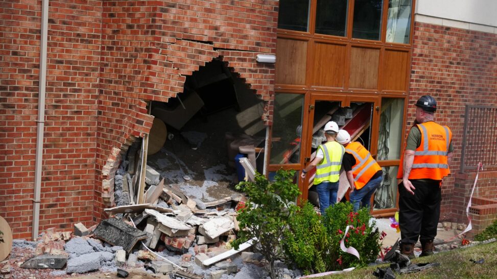 Two women die after bmw crashed into care home during police chase