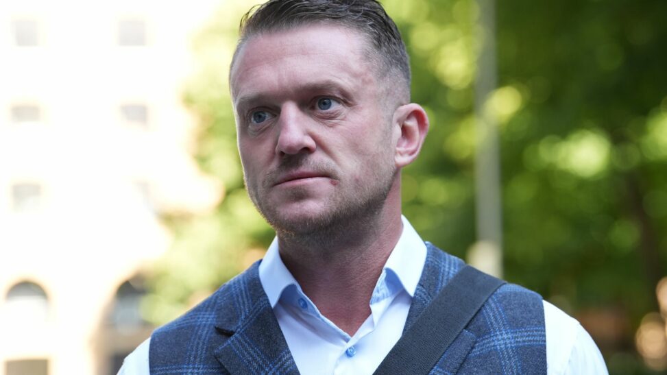 Police investigate assault as video appears to show tommy robinson at station