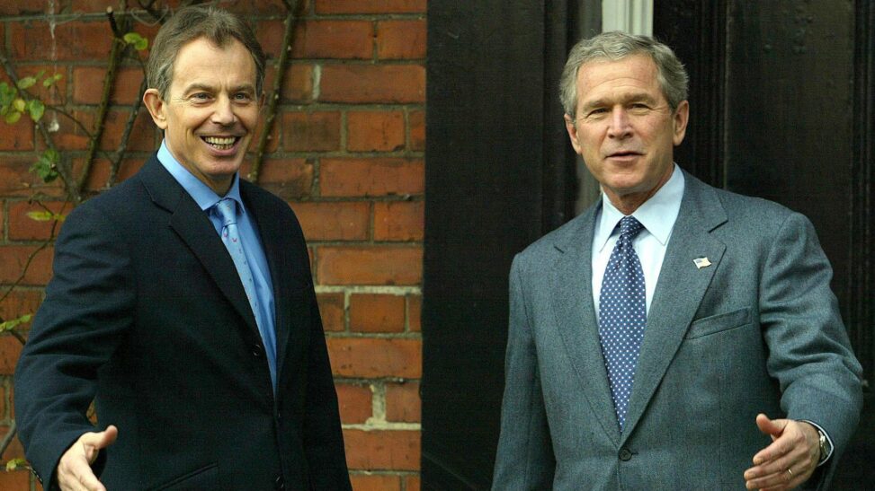 President bush determined to 'rid world of evil doer saddam hussein', new records reveal