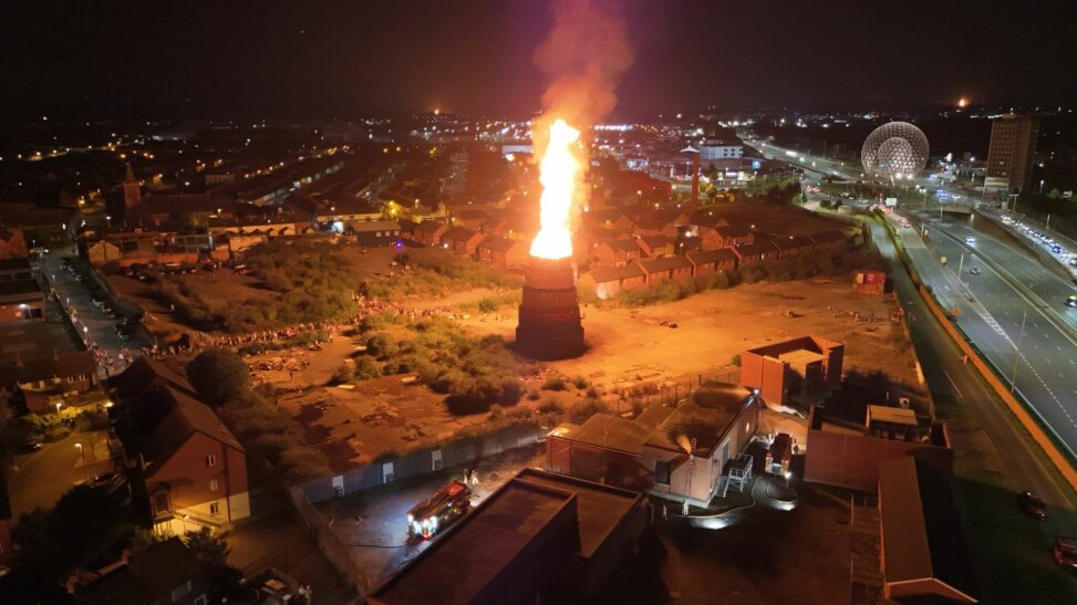 Eleventh night bonfire lit on asbestos site criticised as firefighters face 'challenging' conditions