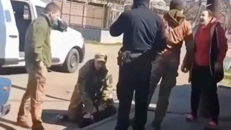 Shoved into vans, slashing tyres: ukrainians balk at conscription