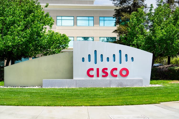 Cisco dips after hsbc cuts rating on valuation, business momentum