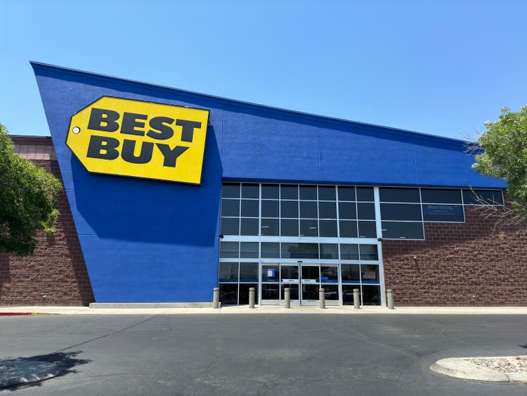 Best buy swings to a loss after bucking the retail trend of hiking guidance