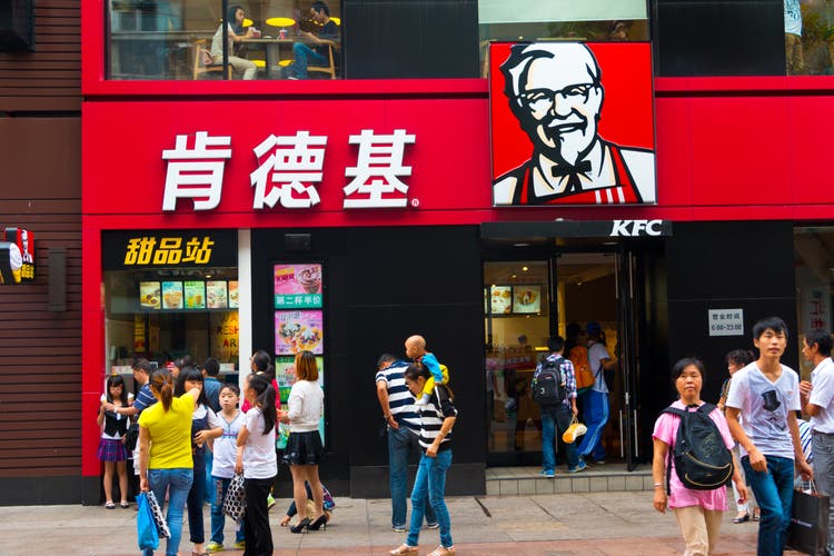 Yum china gains after seeing same store sales turn positive in q2
