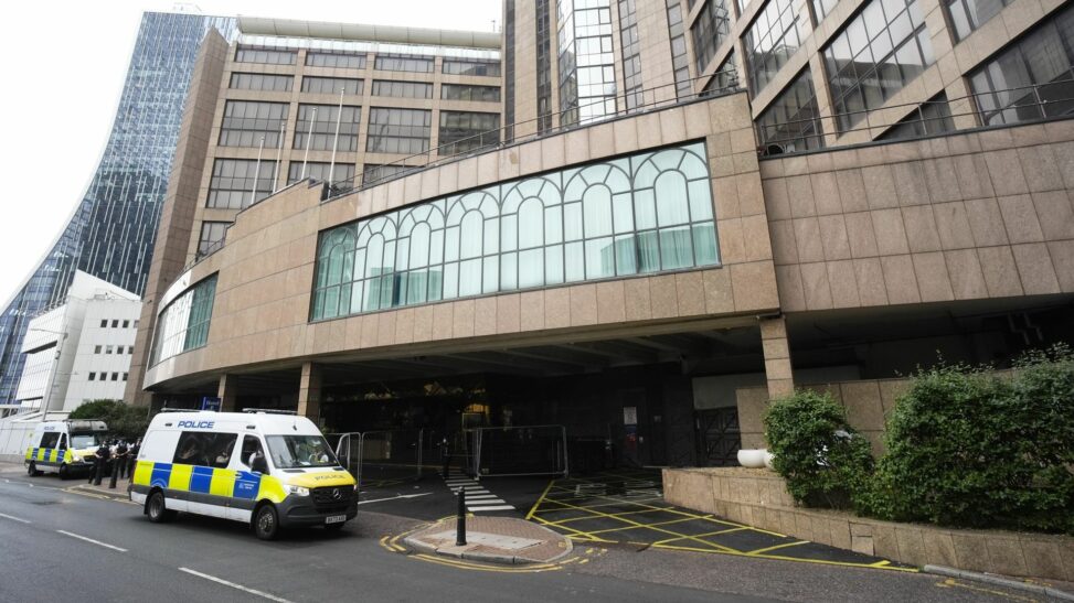 Woman charged with assaulting security guard at hotel housing migrants after one resident 'walked into her flat'