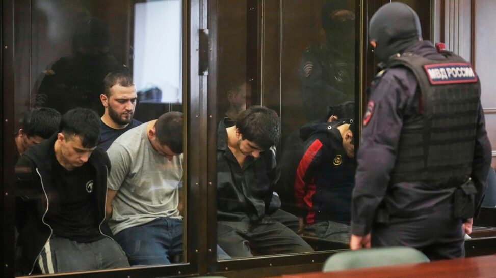 Suspected gunmen go on trial over concert hall massacre