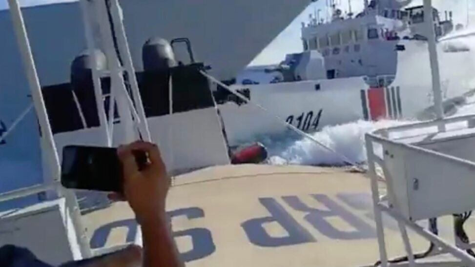 'dangerous manoeuvres' condemned as vessels collide in disputed waters