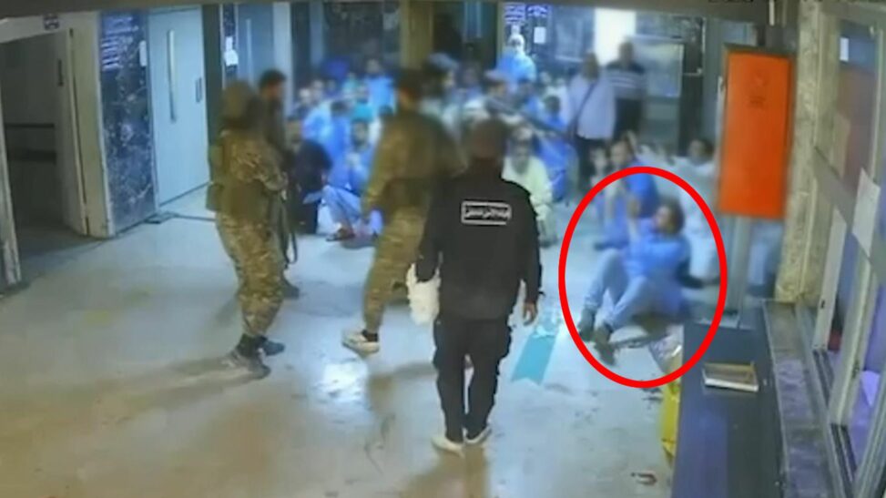 'they told us they were the syrian army': cctv shows hospital volunteer being shot dead at point blank range