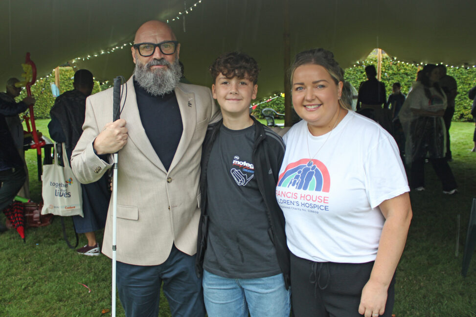 The blind poet gives first reading of children’s book at hospice family event.