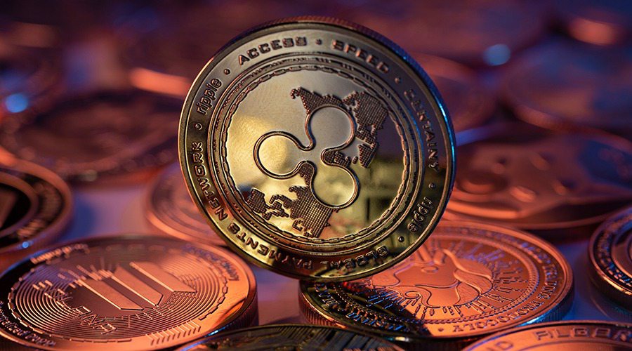 Xrp faces trendline resistance amid triangle pattern, analysts note rising bets
