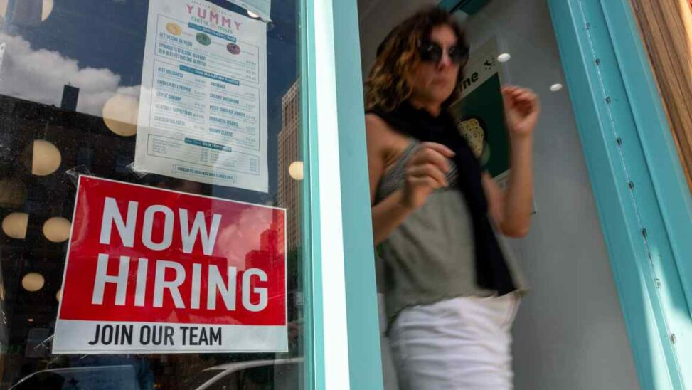 Us hiring growth revised down by 911,000 jobs in year to march