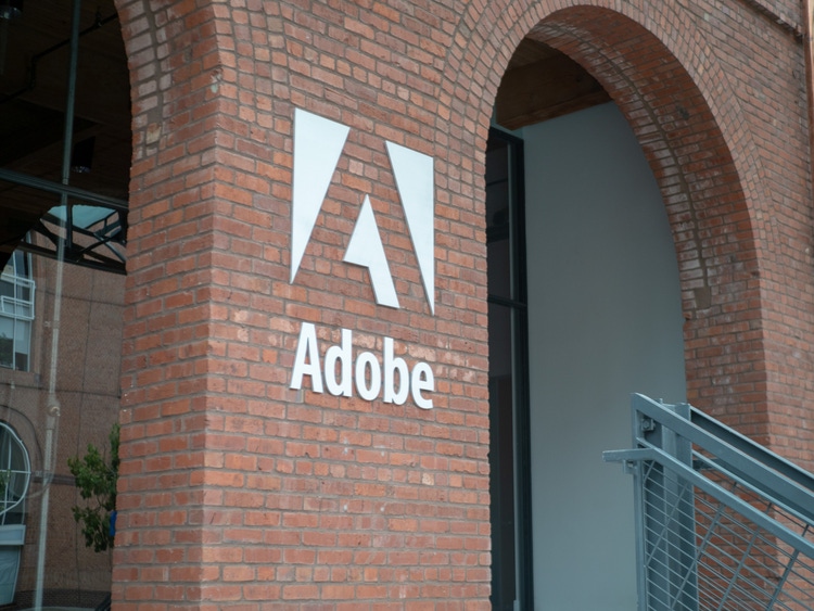 Adobe reaches ai monetization goal ahead of schedule, but some analysts remain in wait and see mode