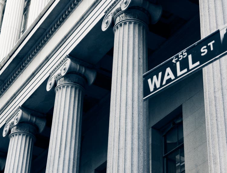 Wall street slides as renewed tariff uncertainty weighs