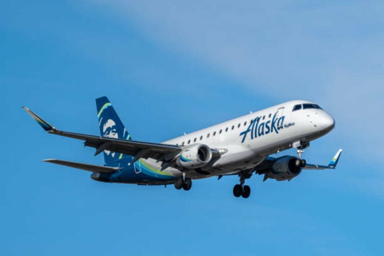 Alaska air falls after lowering q3 profit expectations