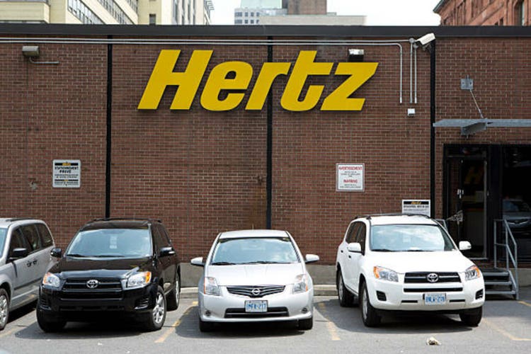 Hertz global breaks into selling cars online to retail customers; carvana and carmax dip