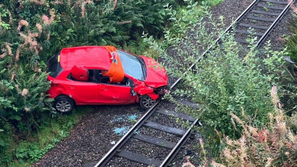 Rail disruption after car crashes onto track in scotland