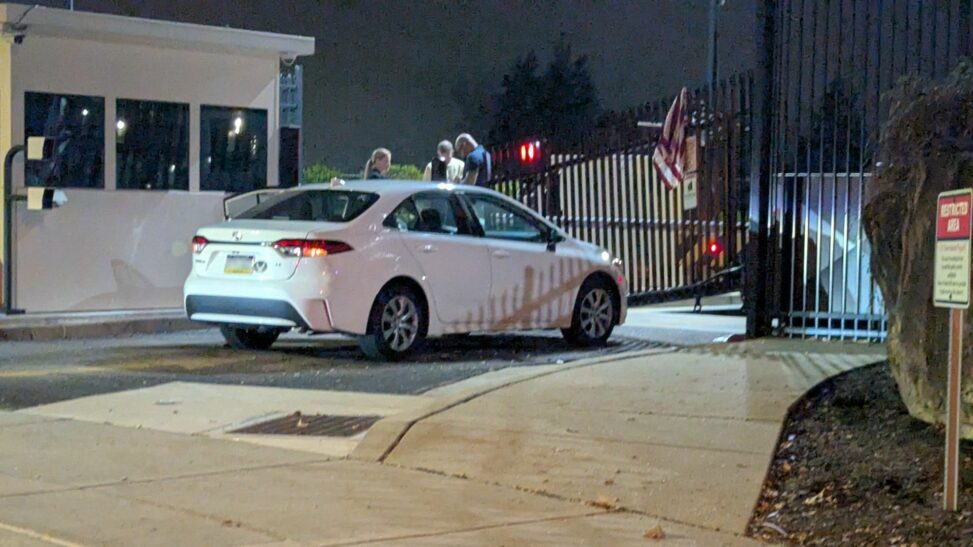 Search underway for man who crashed car into fbi office gates in 'act of terror'