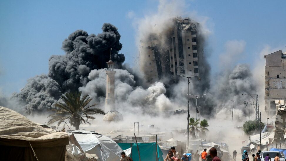 Two hostages shown in hamas video as israel strikes high rise building in gaza city