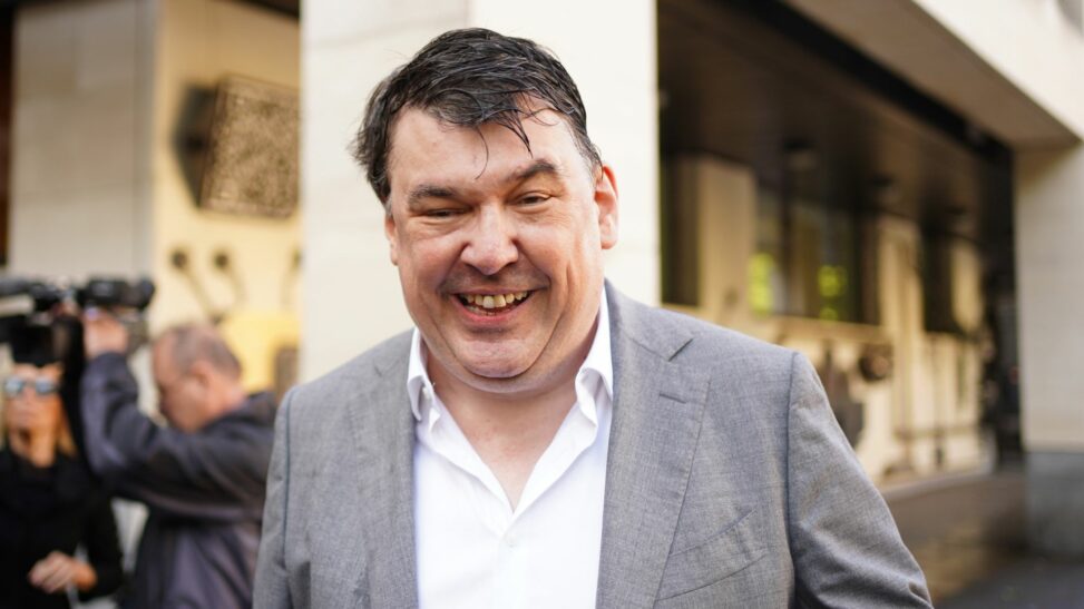 Father ted co creator arrives for trial charged with harassing transgender activist