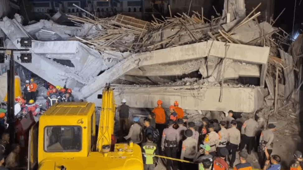 Dozens feared trapped after school building collapses