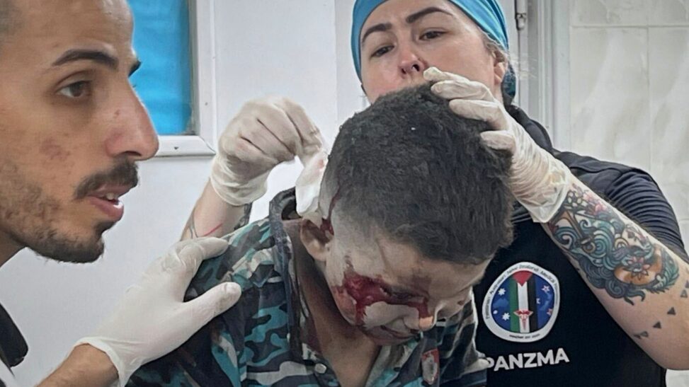 Destruction of gaza hospital witnessed by nurse whose colleagues tell her 'they are going to die'