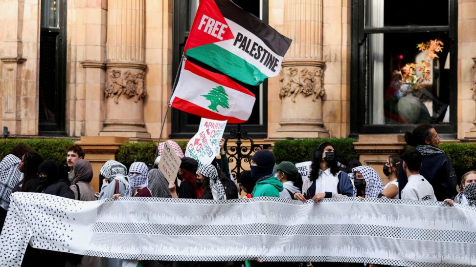 Flag waving pro palestinian protesters reject pm's claims that they are being 'un british'