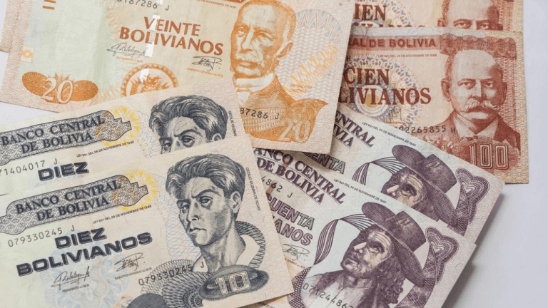 Bolivia abandons fixed exchange rate scheme after 15 years, adopting a floating dollar system